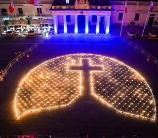 A photo showing the installation of fire bowls in St George's Square Valletta