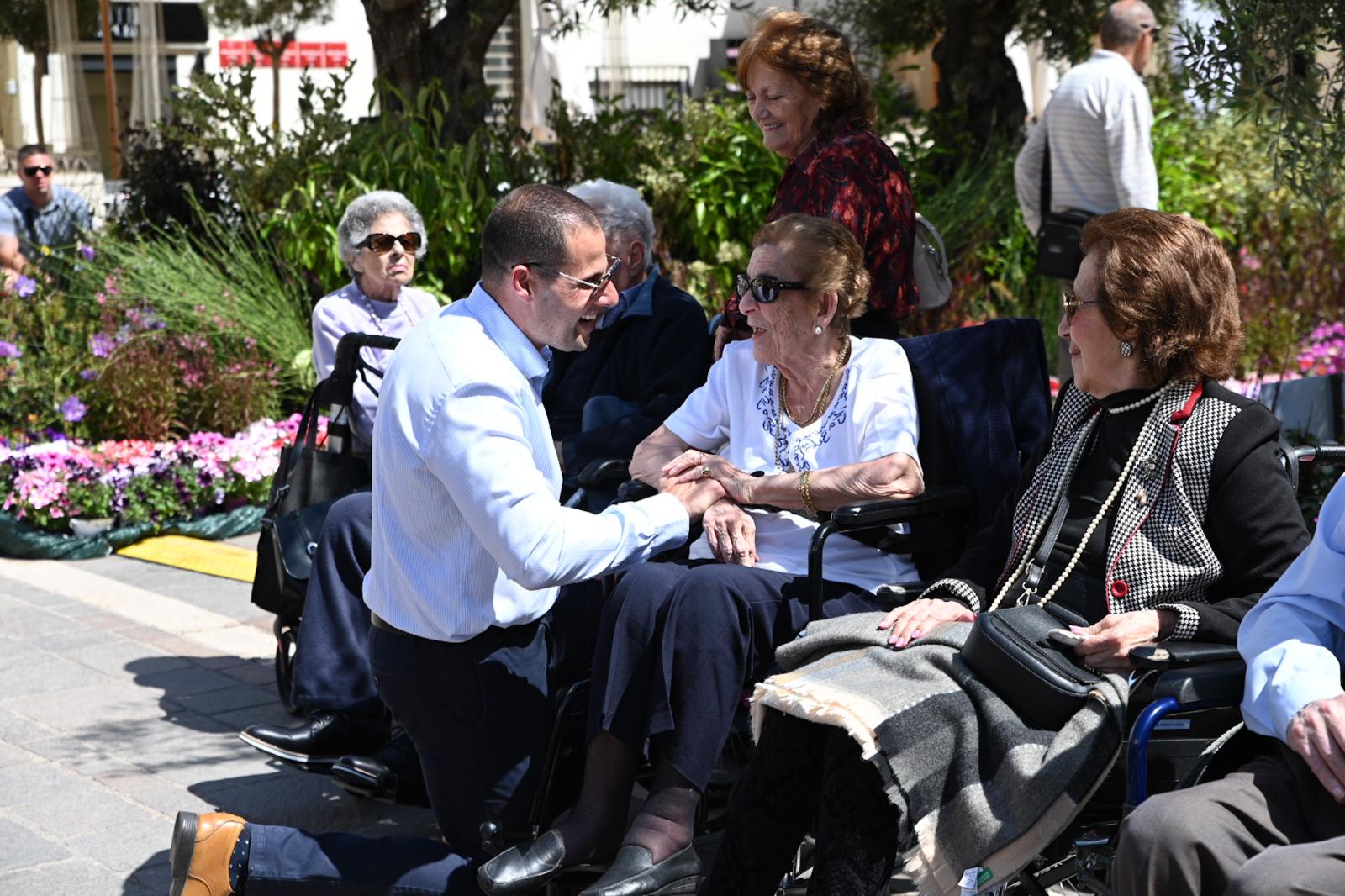A photo showing Prime Minister Robert Abela with elderly people at the Valletta Green Festival 