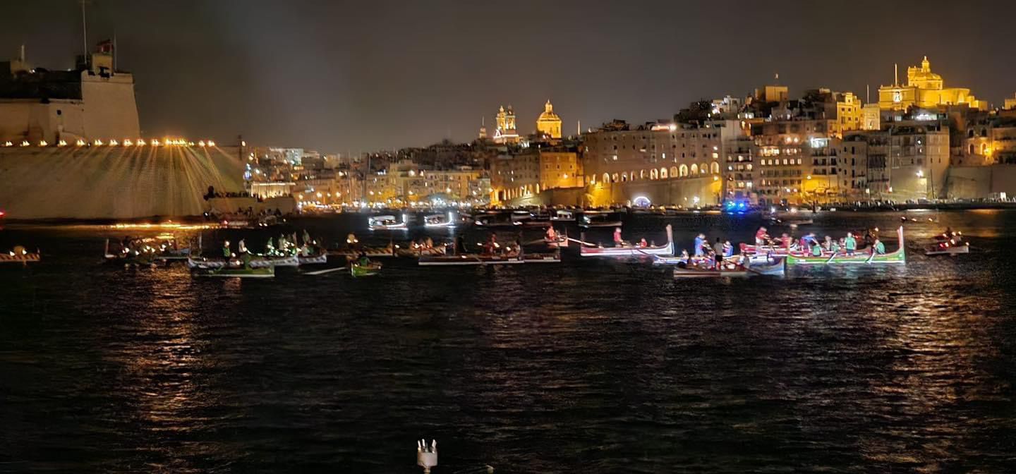 A photo showing traditional boats participating in the Valletta Pageant of the Seas 2024