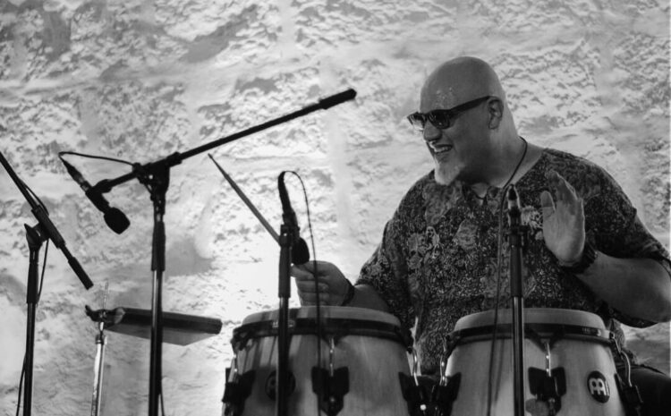 A photo showing Adrian Galea Lucas on the congas