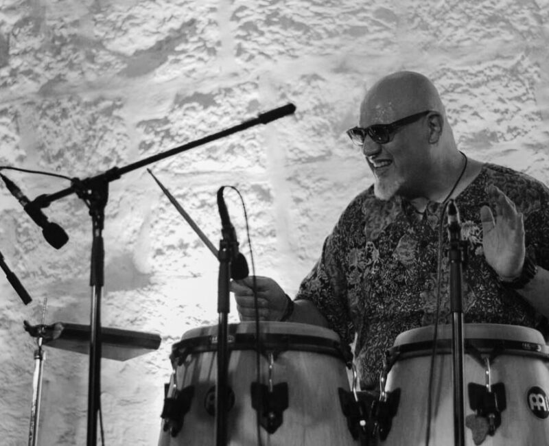 A photo showing Adrian Galea Lucas on the congas